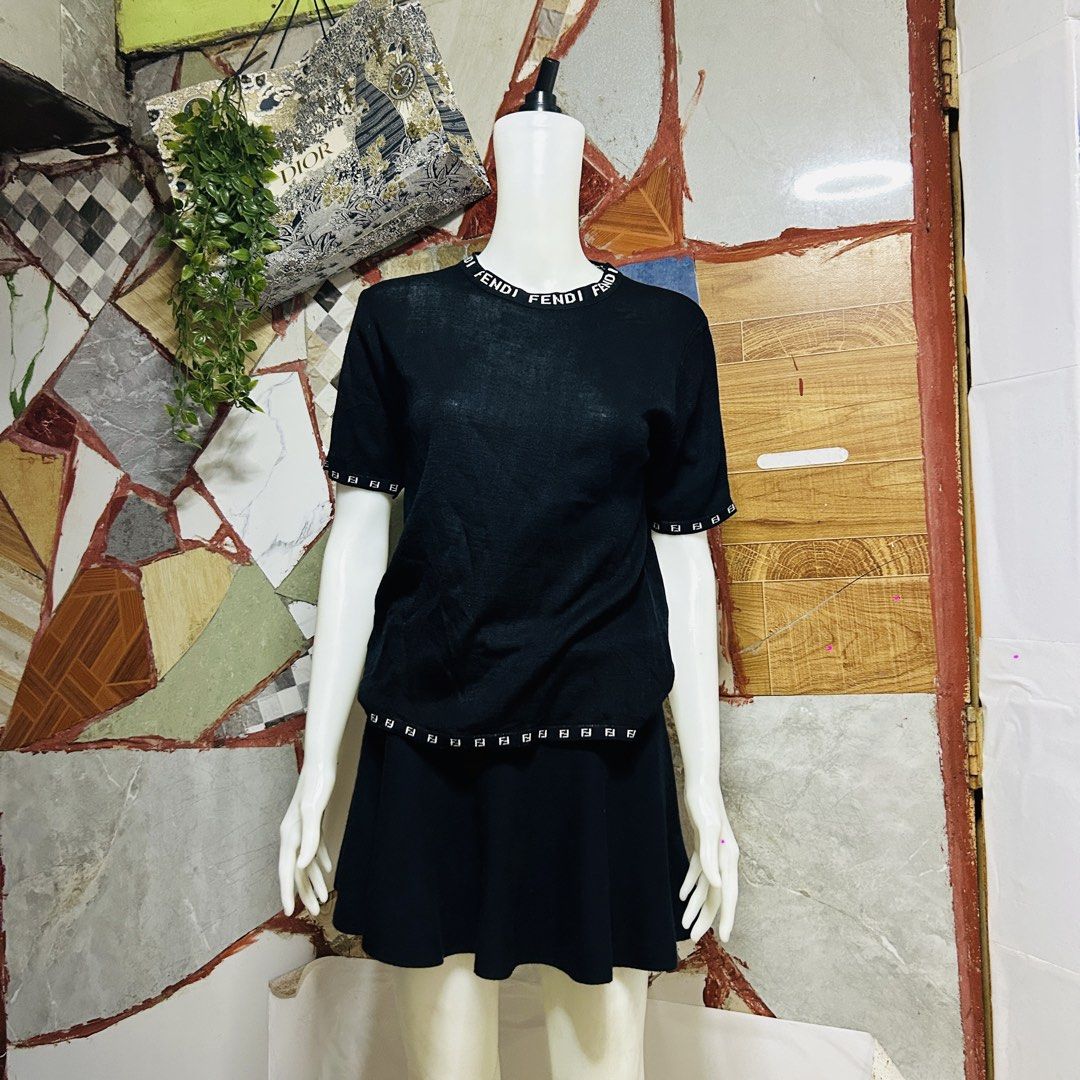 Fendi knit top (Category: Luxury Apparel) located in Baguio. Submitted by kckc_luxury (Listing ID 1465104049, Image 2). Description: 🌸 TINY PINK SPOTS ARE LENS DAMAGE, NOT CLOTH STAINS ————————— ❗️KINDLY READ BEFORE MAKING AN OFFER❗️ LISTING DETAILS size:M width x length (inches):24x23 condition: Good condition --- MOP: Gcash / BPI MOD: J&T / JRS LOCATION: Baguio City --- NOTE: • Manage your expectations • Photos did not go under any edit but co