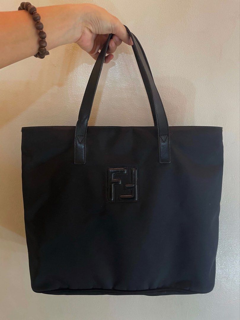 Fendi Nylon Tote (Category: Luxury Bags & Wallets) located in Manila. Submitted by thevintagebow (Listing ID 1465110206, Image 1). Description: Effortless, understated, and endlessly versatile. ☕️ If you love the clean, minimalist Italian aesthetic, this pre-loved Fendi Black Nylon Tote is your new go-to. Feather-light yet durable, featuring subtle leather trims and the classic center FF crest. Price: ₱8,000 PHP ONLY Market Resale Price: ₱14,000-
