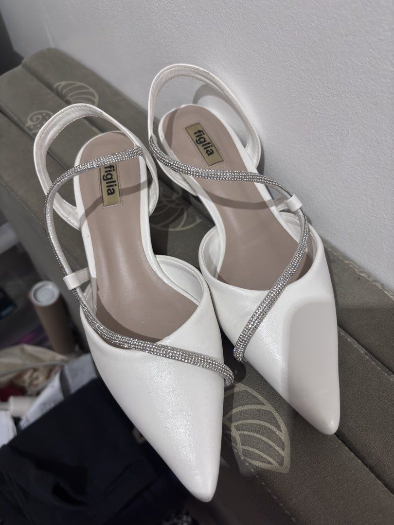 Figlia White Heels (Category: Heels) located in Manila. Submitted by niellaeun (Listing ID 1465048814, Image 2). Description: Still negotiable for sure buyers Original Price: 1,600 Excellent Condition, with box Used once Size: 37-38 .