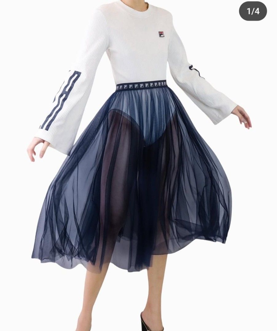Fila Blue Mesh Tulle Midi Skirt (Category: Skirts) located in Manila. Submitted by PrinceDani.Clothing (Listing ID 1465105600, Image 1). Description: fila blue mesh skirt 2xl on tag Size 30-40in waist 30in length excellent condition .