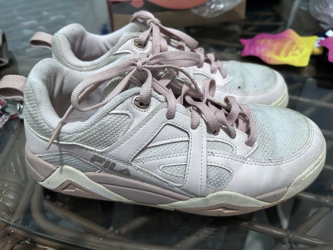 Fila Pink Chunky Sneakers (Category: Sneakers) located in Manila. Submitted by elnemeeh_05 (Listing ID 1465020373, Image 1). Description: - Brand: Fila - Color: Pink - Style: Chunky soles, lace-up front, daily casual - Materials: Breathable mesh panels with faux leather overlays - Features: Convenient heel pull tab for easy wear - Condition: Light wear visible on the toe area and soles.