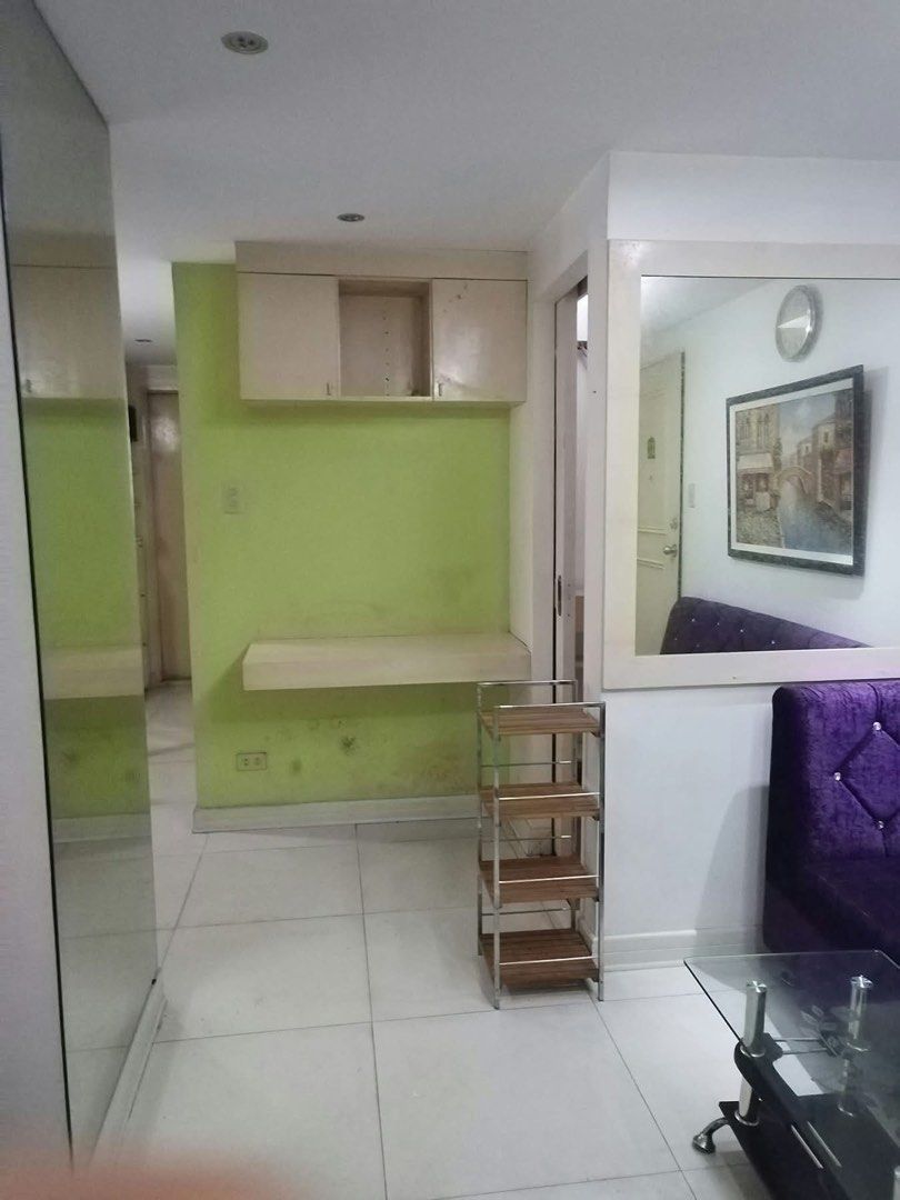 CONDO FLORA VISTA COMMONWEALTH (Category: Apartments & Condos) located in Manila. Submitted by pialoved (Listing ID 1465000545, Image 3). Description: Selling my unit Price: 2.2M If with parking additional 700k No to agents Flora Vista Condominium Peacock street Fairview QC Semi- furnished 30sqm Located at the ground floor 1 bedroom 1 bathroom with heater 1 kitchen 1 living room 1 dining table 1 prayer room, can be converted to study room 1 airco
