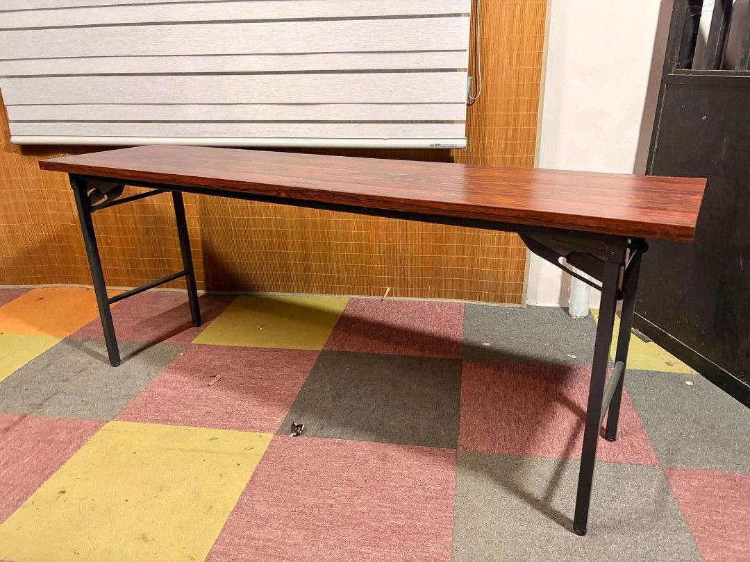 Folding Table (Category: Tables & Sets) located in Meycauayan. Submitted by marygracecasimiro (Listing ID 1465066773, Image 3). Description: KOKUYO Multi-purpose Long Folding Table SOLID WOOD TOP!!! METAL FRAME!!! 2 PIECES AVAILABLE!!! MAKINIS!!! HEAVY-DUTY!!! ANGGANDA!!! *SEE VIDEO COMMENT Price : 6k each (fixed price) ✅ 71L x 18W x 28H inches In VERY good condition 💚.
