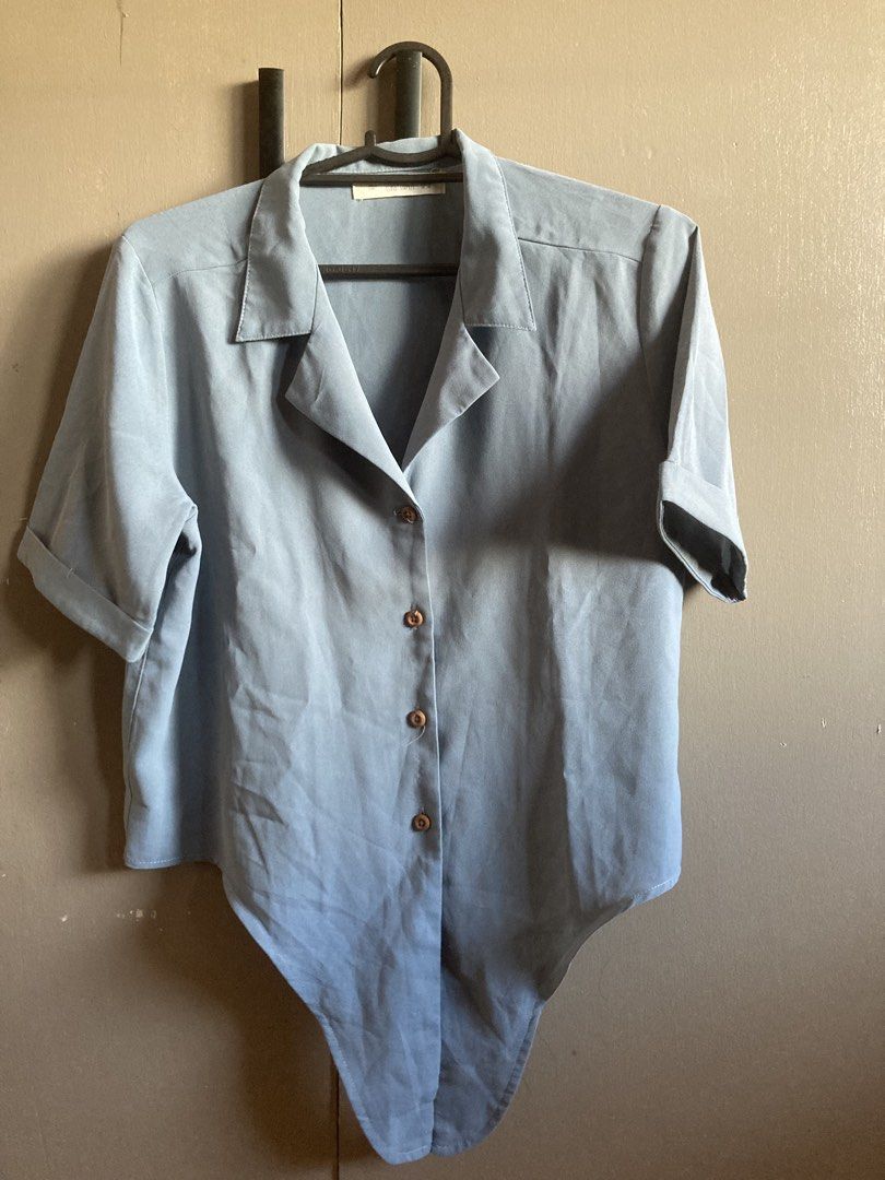 Forme Closet Staples Blue Front Tie Blouse (Category: Blouses) located in Iligan City. Submitted by phoebedecluttersorigitems (Listing ID 1465006738, Image 1). Description: - Brand/Label: Forme Closet Staples - Color: Light Blue - Size: Medium (USA M, EUR 38, UK 10) - Details: Collar neck, tortoiseshell buttons, front tie hem design - Material/Origin: Made in China - Style: Casual top, great for pairing with high-waist jeans or skirts RFS: tumaba