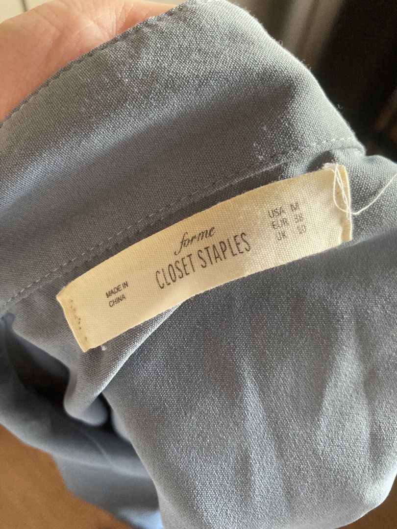 Forme Closet Staples Blue Front Tie Blouse (Category: Blouses) located in Iligan City. Submitted by phoebedecluttersorigitems (Listing ID 1465006738, Image 2). Description: - Brand/Label: Forme Closet Staples - Color: Light Blue - Size: Medium (USA M, EUR 38, UK 10) - Details: Collar neck, tortoiseshell buttons, front tie hem design - Material/Origin: Made in China - Style: Casual top, great for pairing with high-waist jeans or skirts RFS: tumaba