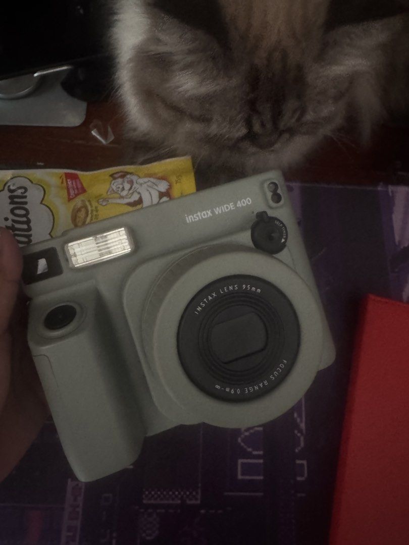 Fujifilm Instax WIDE 400 Instant Camera (Category: Cameras) located in Malabon City. Submitted by belabng29 (Listing ID 1464974158, Image 2). Description: - Model: Fujifilm Instax WIDE 400 instant camera - Color: Green - Format: Uses wide instant film for bigger photos - Features: Chunky grip body and front self-timer dial - Condition: Clean exterior body with minimal wear - Ideal for: Parties, gatherings, and fun hangouts with friends - Rfs: no 