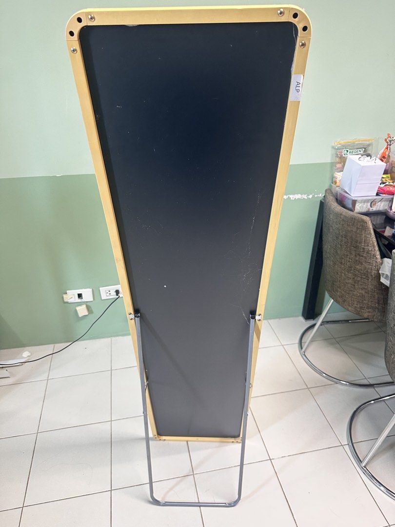 Full length standing mirror with yellow frame (Category: Mirrors) located in Manila. Submitted by merylaloja98489 (Listing ID 1465035792, Image 3). Description: - Tall standing mirror with a light yellow frame - Clean glass with zero cracks and a neat black backing board - Metal stand at the back that folds flat for easy storage and moving - Simple and minimalist design that fits bedrooms, hallways, or living room corners.