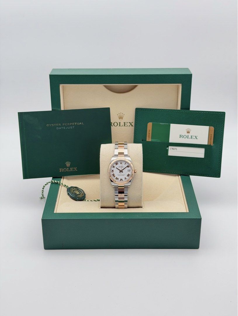 Fullset Rolex Datejust 31mm White Roman Dial (Category: Luxury Watches) located in Manila. Submitted by timelesseleganceph (Listing ID 1465041051, Image 2). Description: Fullset Rolex Datejust 31mm White Roman Dial Reference 178271 Size 31mm Dated 2018 18k RG in White Roman Dial on Oyster Bracelet Complete/Fullset - Box, Warranty Card, Card Holder, Booklets, Tag.