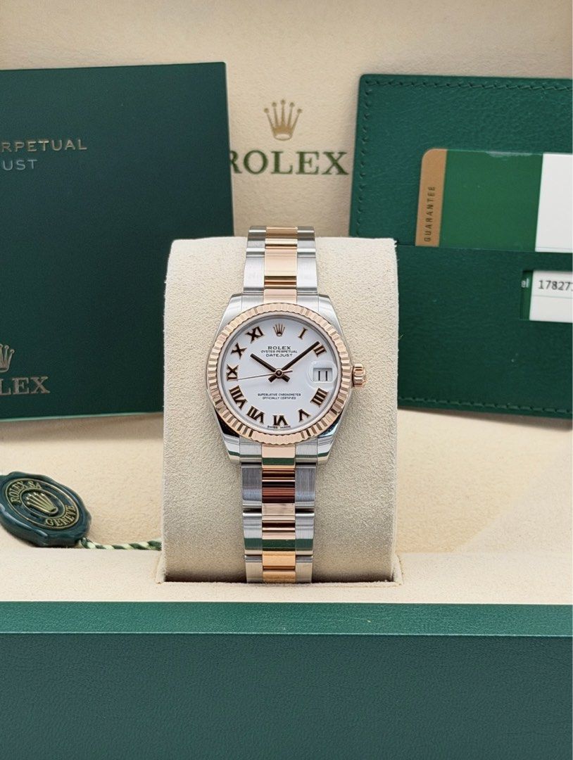 Fullset Rolex Datejust 31mm White Roman Dial (Category: Luxury Watches) located in Manila. Submitted by timelesseleganceph (Listing ID 1465041051, Image 1). Description: Fullset Rolex Datejust 31mm White Roman Dial Reference 178271 Size 31mm Dated 2018 18k RG in White Roman Dial on Oyster Bracelet Complete/Fullset - Box, Warranty Card, Card Holder, Booklets, Tag.