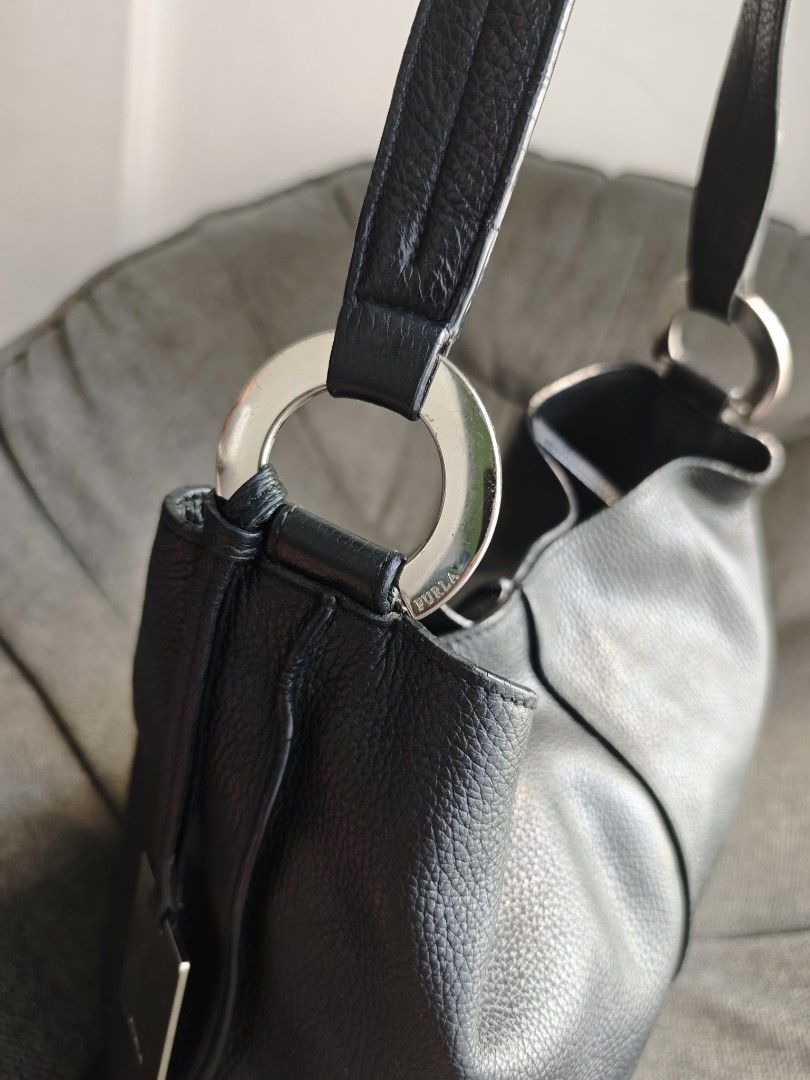 Furla hobo bag (Category: Luxury Bags & Wallets) located in Panabo. Submitted by kzmbags2026 (Listing ID 1465046085, Image 3). Description: Furla leather hobo / shoulder bag excellent size: 12" x 12.5".
