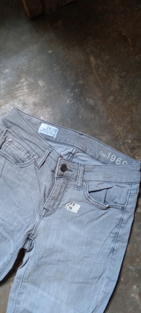 Gap 1969 Perfect Boot Grey Jeans Size 24/00 (Category: Jeans) located in Manila. Submitted by ezekislacl02490 (Listing ID 1465090521, Image 2). Description: Gap 1969 jeans in grey. Size 24/00. Bootcut style with slight flare at the hem. Classic five-pocket design, button and zip fly closure. Stretchy denim material. Stamped branding inside the waistband and back pocket label..