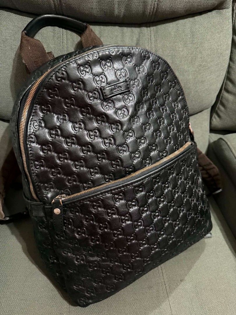 GG Embossed Backpack (Category: Backpacks) located in Quezon City. Submitted by luxxechic (Listing ID 1465039996, Image 1). Description: coded GG under zip pure leather looks new no issue actual photo posted japan preloved mop: gcash.