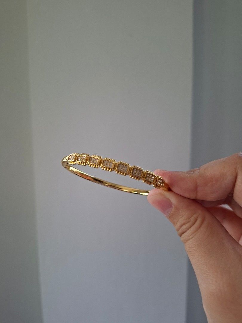 Gold Cube Designs Bangle Bracelet (Category: Bracelets) located in Dasmarinas. Submitted by danabrie22 (Listing ID 1464992460, Image 3). Description: very well-made, excellent crafstmanship 10/10 condition brand new stainless steel & crystal-colored cubic zirconia stones made in Hongkong.