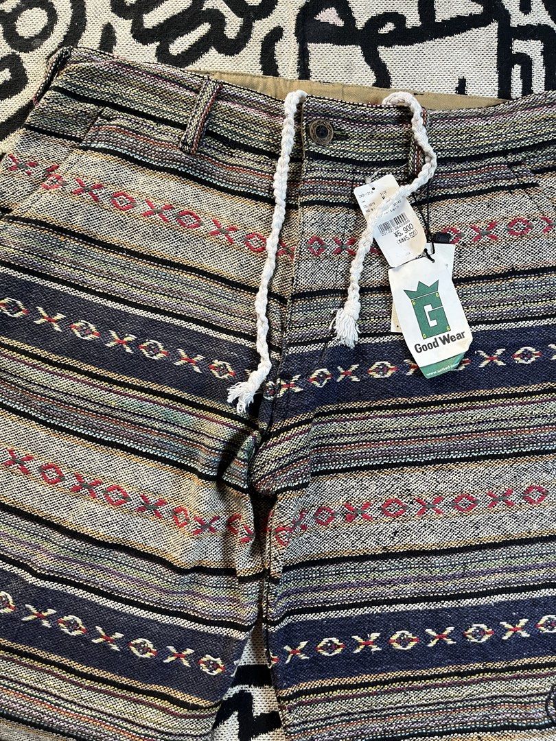 Good Wear Aztec Pattern Woven Shorts Medium (Category: Shorts) located in Silang. Submitted by yusthrift (Listing ID 1464997314, Image 2). Description: - Brand: Good Wear - Condition: Brand new with original store tags attached - Size: Medium (Waist: 84cm) - Design: Eye-catching multicolored Aztec geometric stripe pattern - Waistband: Drawstring with button closure and belt loops - Pockets: Two back pockets with button flaps - Material: Premium b