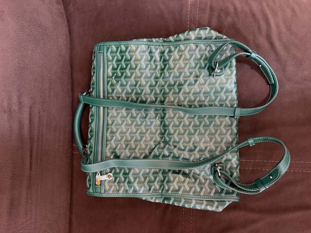 Goyard Green Saigon Backpack (Category: Backpacks) located in Dagupan City. Submitted by calligenia (Listing ID 1464997641, Image 2). Description: Goyard backpack in green chevron canvas. Leather top handle and adjustable shoulder straps. Front flap with turn-lock closure plus side zipper entry. Silver-tone hardware. Vibrant yellow fabric interior lining with some visible staining throughout. Debossed Goyard Paris logo stamp inside. Measures medi