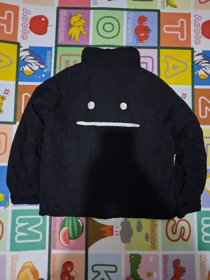 Graniph Beautiful Shadows Padded Blouson Jacket Size L (Category: Coats, Jackets and Outerwear) located in Manila. Submitted by rossthrift (Listing ID 1465130956, Image 3). Description: - Brand/Model: Graniph Padded Blouson Jacket - Color: Black - Size: Large (L) - Design: Fun face graphic on the back with a small graphic patch near the hem - Lining: Stylish all-over shadow character pattern on the inner lining - Features: Zip-up front, high coll
