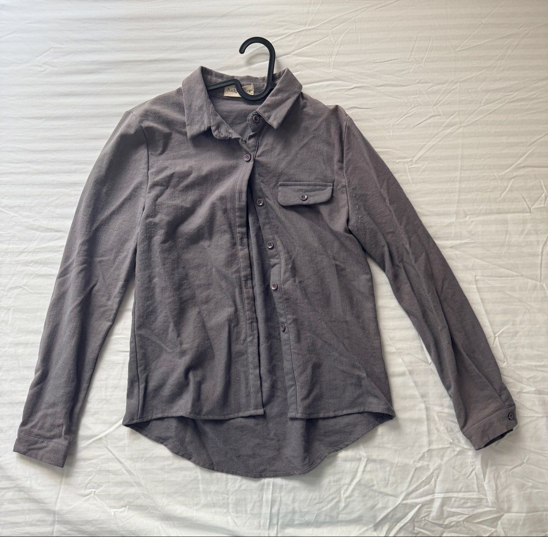 Grey long sleeve button-up shirt (Category: Longsleeves) located in Angeles City. Submitted by suareztrish (Listing ID 1465022000, Image 1). Description: ❕ Price is exclusive of shipping fee MOD: J&T MOP: GCash, BPI Conditon: ✳️ bought in fudge rock ✳️ used once, in good condition ✳️ rfs: decluttering ✳️ unisex ✳️ can send pics when worn ✳️ payment first before shipping ✳️ reservation for a week ONLY.