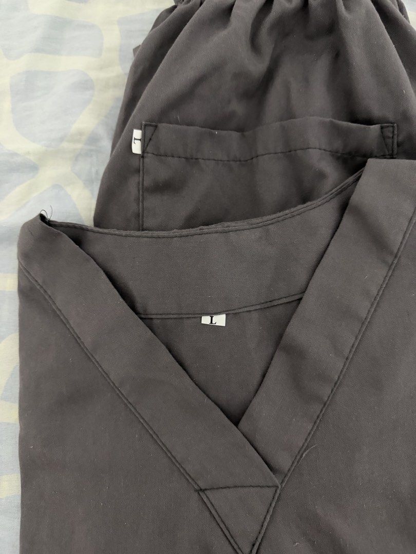 Grey Scrub Set V-Neck Top and Pants Size L (Category: Sets & Coordinates) located in Manila. Submitted by emmanuelam56250 (Listing ID 1465107783, Image 2). Description: - Matching Grey Scrub Set - Size: L (Tags attached on both pieces) - Condition: Brand new, clean, ready to wear (Only used once) - Design: V-neck top - Fit: Comfortable relaxed fit - Ideal for: Healthcare workers, medical professionals, and students - Color: Grey RFS: medyo malaki