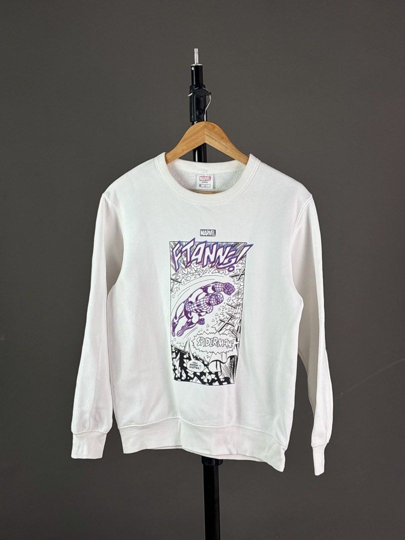 GU Marvel Spider-Man Comic Print White Sweatshirt Size S (Category: Coats, Jackets and Outerwear) located in Malilipot. Submitted by brevsthrift (Listing ID 1465129510, Image 1). Description: White Marvel Spider-Man graphic sweatshirt from GU. Front features comic book panel print with Spider-Man illustration. Ribbed collar, cuffs, and hem. Size S tag at collar. Interior material care tag reads GU with cotton and polyester blend. Soft fleece lini