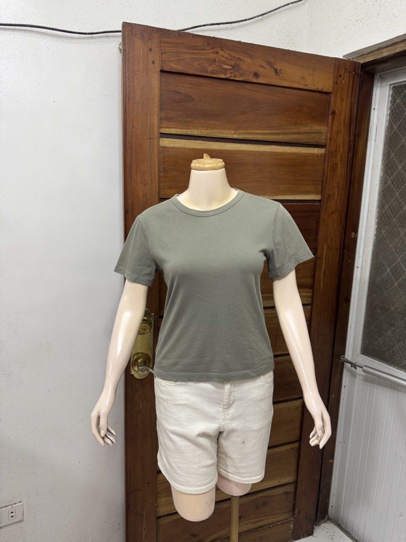 GU Sage green basic short sleeve t-shirt size S (Category: Shirts) located in Cavite. Submitted by yakultjeni85475 (Listing ID 1465124047, Image 3). Description: - Color: Sage Green - Size: S - Material: Soft Cotton - Design: Short sleeves, classic crew neck - Condition: Clean and ready to wear - Easy to pair with shorts or jeans.