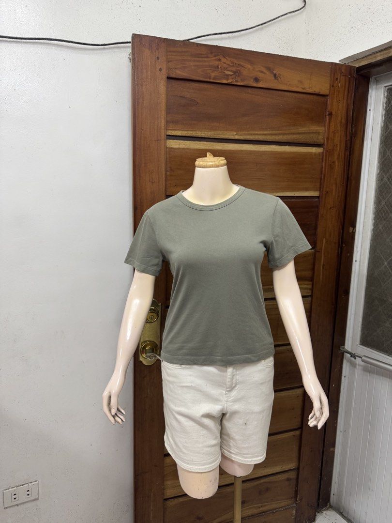 GU Sage green basic short sleeve t-shirt size S (Category: Shirts) located in Cavite. Submitted by yakultjeni85475 (Listing ID 1465124047, Image 2). Description: - Color: Sage Green - Size: S - Material: Soft Cotton - Design: Short sleeves, classic crew neck - Condition: Clean and ready to wear - Easy to pair with shorts or jeans.