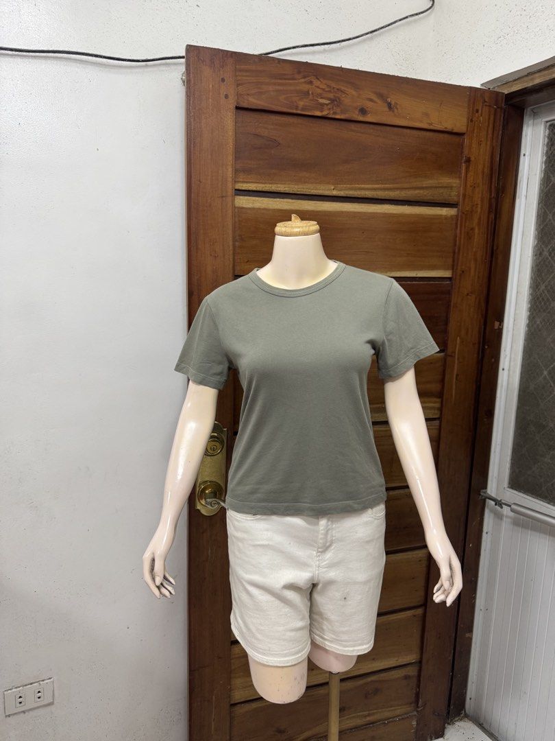 GU Sage green basic short sleeve t-shirt size S (Category: Shirts) located in Cavite. Submitted by yakultjeni85475 (Listing ID 1465124047, Image 1). Description: - Color: Sage Green - Size: S - Material: Soft Cotton - Design: Short sleeves, classic crew neck - Condition: Clean and ready to wear - Easy to pair with shorts or jeans.