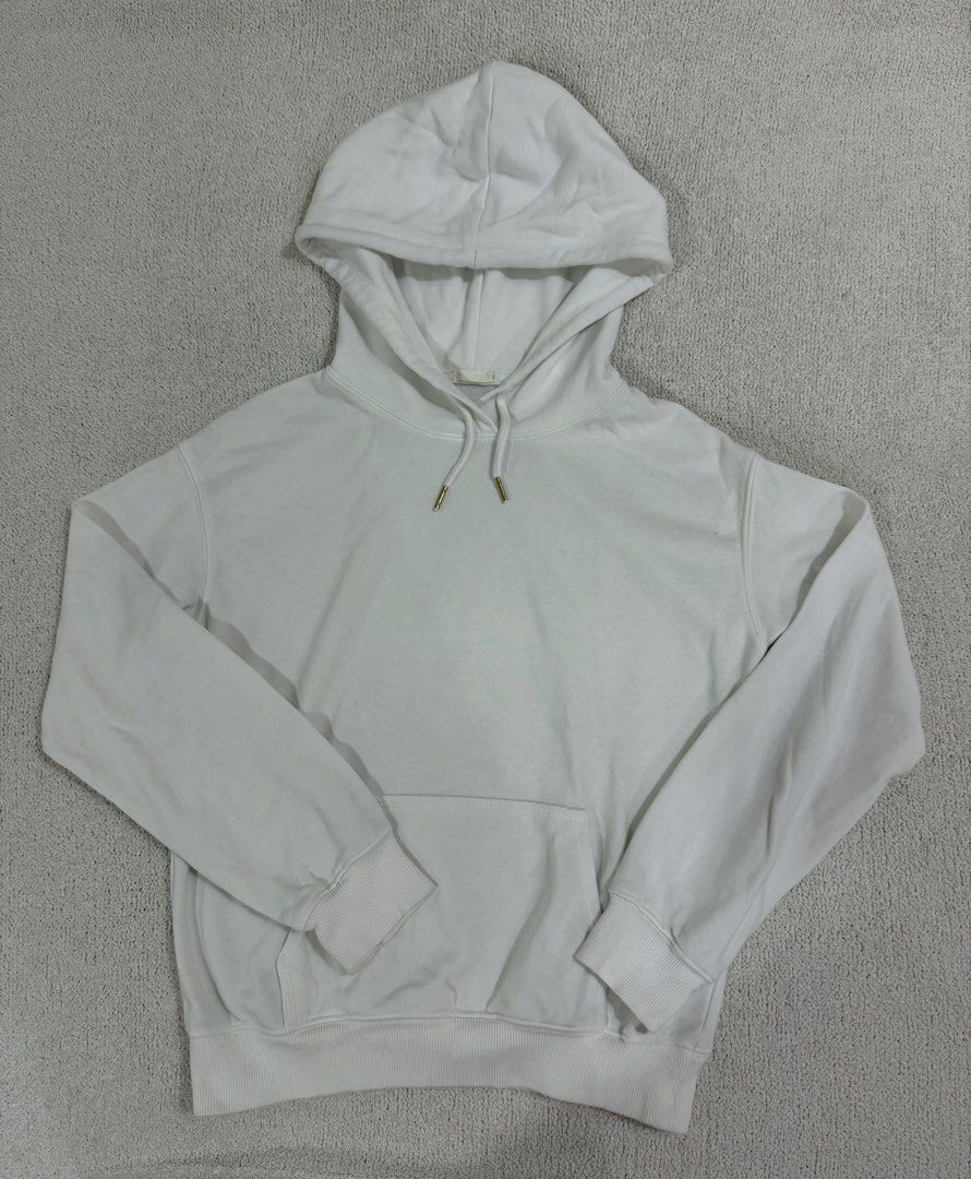 GU White Hoodie S (Category: Coats, Jackets and Outerwear) located in Subic. Submitted by kittysclosetsale (Listing ID 1465030871, Image 1). Description: - Brand: GU - Color: Plain White - Style: Classic pullover hoodie with matching drawstring hood and front pouch pocket - Material: 80% cotton, 20% polyester blend; Ribbing has 96% cotton, 4% spandex - Fit/Feel: Comfortable everyday sweatshirt, great for layering - Condition: Brand new / Excellen