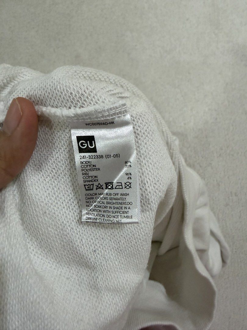 GU White Hoodie S (Category: Coats, Jackets and Outerwear) located in Subic. Submitted by kittysclosetsale (Listing ID 1465030871, Image 3). Description: - Brand: GU - Color: Plain White - Style: Classic pullover hoodie with matching drawstring hood and front pouch pocket - Material: 80% cotton, 20% polyester blend; Ribbing has 96% cotton, 4% spandex - Fit/Feel: Comfortable everyday sweatshirt, great for layering - Condition: Brand new / Excellen