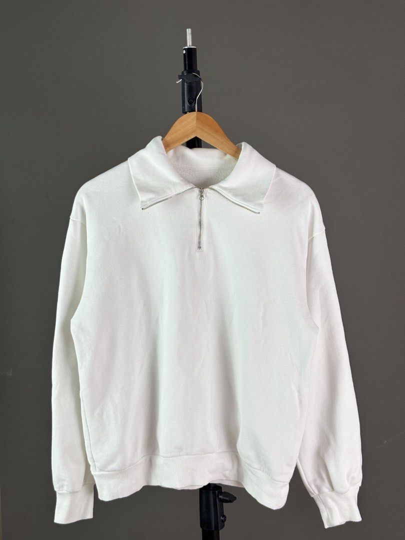 GU White Quarter-Zip Sweatshirt Size (Category: Coats, Jackets and Outerwear) located in Malilipot. Submitted by brevsthrift (Listing ID 1465126180, Image 1). Description: - Brand: GU - Style: Half-zip sweatshirt with collar neck and silver zipper pull - Color: Crisp white - Size: S - Interior: Soft fleece lining for extra comfort - Details: Ribbed cuffs and hem that keep their shape well - Care: Easy-wash material mix - Condition: Excellent cond