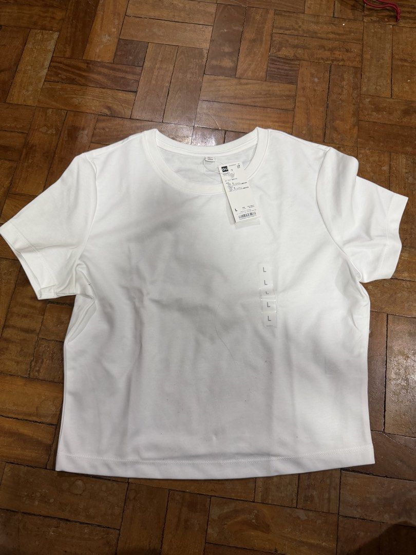 GU womens shirt (Category: Shirts) located in Davao. Submitted by declutter29731 (Listing ID 1465081917, Image 1). Description: Avail in black and white.