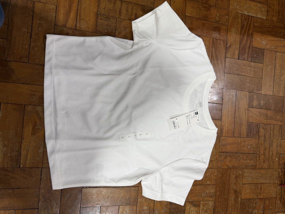 GU womens shirt (Category: Shirts) located in Davao. Submitted by declutter29731 (Listing ID 1465081917, Image 2). Description: Avail in black and white.