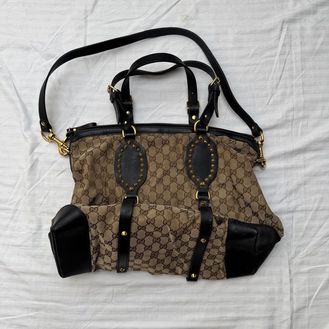 GUCCI GG CANVAS JOLICOEUR (Category: Luxury Bags & Wallets) located in Pasig City. Submitted by jaaard (Listing ID 1464983072, Image 1). Description: For sale Needs cleaning no major issue see pics Pm me for sure buyers .