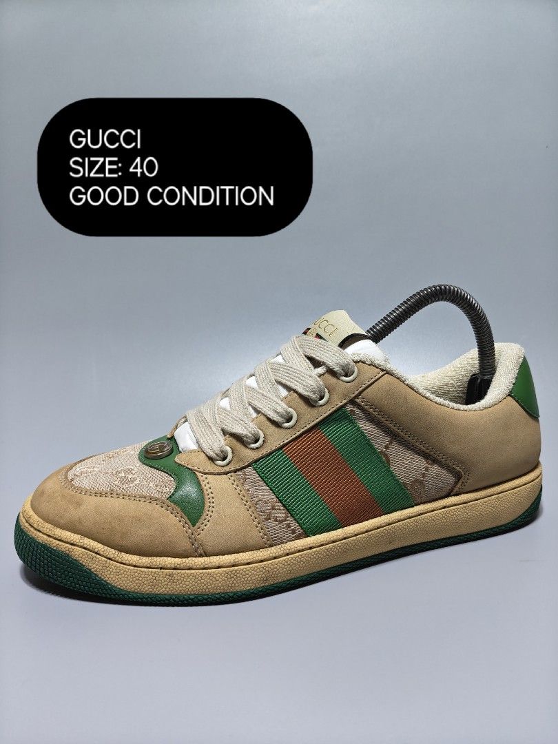 Gucci Sneakers Size 40 (Category: Sneakers) located in Manila. Submitted by baguiogirlyy (Listing ID 1465096386, Image 1). Description: - Brand: Gucci - Colorway: Tan and beige with iconic green and red web stripe - Size: EU 40 - Material: Premium leather with suede panels on toe and heel - Style: Classic low-top silhouette with flat laces - Sole: Rubber outsole with great traction - Condition: Well-maintained, ready to wear - Mode of Payment: GC
