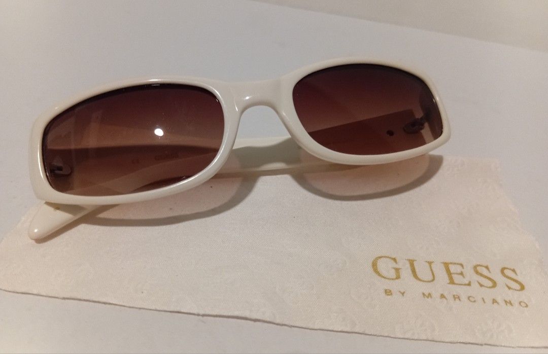 Guess Sunglasses (Category: Sunglasses & Eyewear) located in Marikina City. Submitted by nico.outlet (Listing ID 1465020138, Image 1). Description: - white guess sunglasses - lightly used - with case.