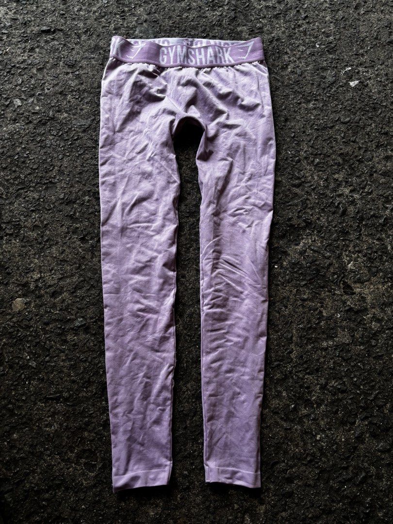 Gymshark Purple Leggings (Category: Activewear) located in Caloocan City. Submitted by neweagle-424b (Listing ID 1465102131, Image 1). Description: - Brand: Gymshark - Color: Pastel purple - Fit: Full length with a supportive wide elastic waistband - Design: Features branded Gymshark lettering and logo - Material: Soft, stretchy, and movement-friendly fabric - Condition: Great for workouts, yoga, or casual wear - Easy to match: Pairs perfectly wi