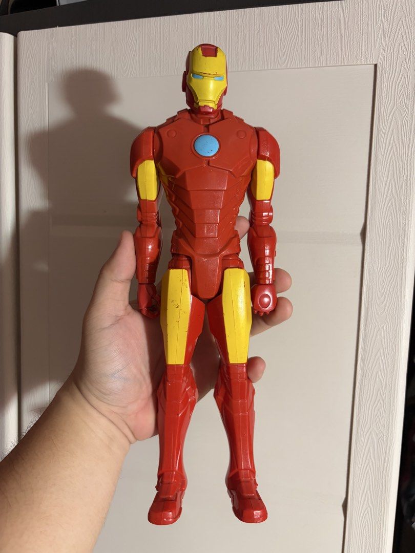 Hasbro Iron Man Action Figure Marvel 2014 (Category: Figurines & Statues) located in Plaridel. Submitted by moddedjarvis (Listing ID 1465169762, Image 1). Description: - Authentic 2014 Hasbro Iron Man action figure - Features classic red and yellow armor design with blue chest arc reactor - Stands upright easily, perfect for display or play - Back is solid red plastic - Great addition to any Marvel or Avengers collection!.