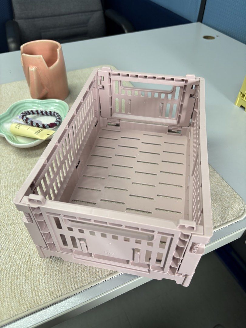 HAY Crate in Blush (Category: Storage Boxes & Baskets) located in Taguig. Submitted by meismeemaw (Listing ID 1464980608, Image 2). Description: Selling at the price I got it for Size small but fits a lot Size dimensions: 10.5 cm high x 17 cm wide x 26.5 cm long.