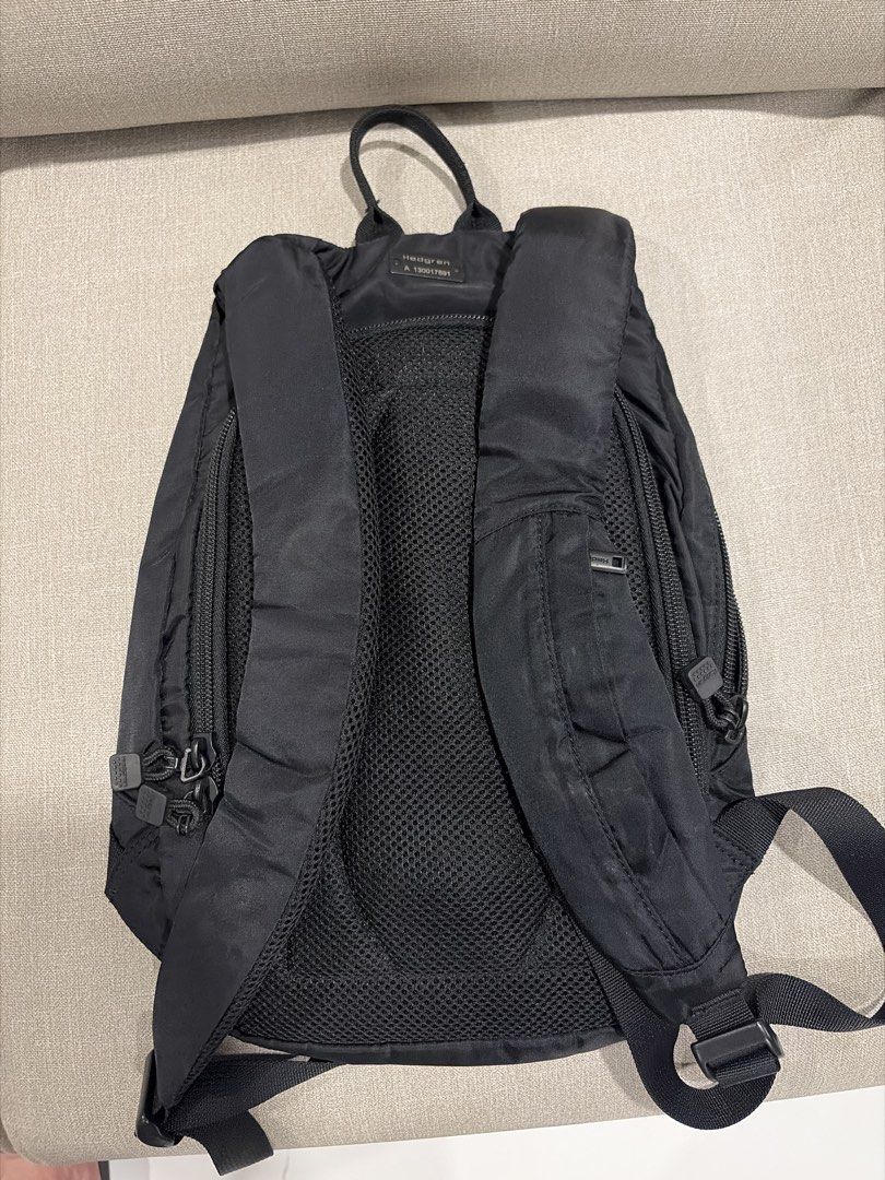 Hedgren - Black Backpack (Category: Backpacks) located in Manila. Submitted by miguelfits (Listing ID 1465071855, Image 2). Description: - Brand: Hedgren - Color: Black - Material: Lightweight nylon with comfortable mesh back panel - Closure: Front zip pocket with secure toggle lock - Features: Adjustable shoulder straps and sturdy top handle - Storage: Multiple internal and external compartments for effortless daily organizing - Condition: Clean