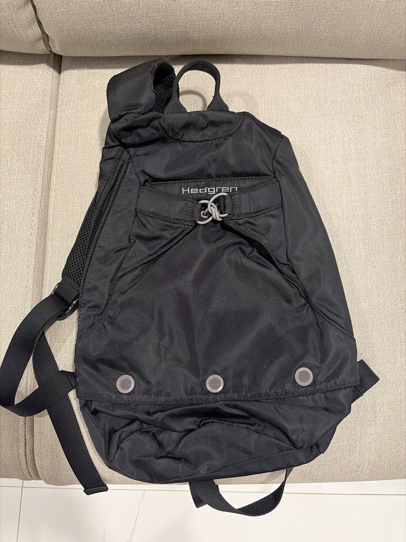 Hedgren - Black Backpack (Category: Backpacks) located in Manila. Submitted by miguelfits (Listing ID 1465071855, Image 1). Description: - Brand: Hedgren - Color: Black - Material: Lightweight nylon with comfortable mesh back panel - Closure: Front zip pocket with secure toggle lock - Features: Adjustable shoulder straps and sturdy top handle - Storage: Multiple internal and external compartments for effortless daily organizing - Condition: Clean