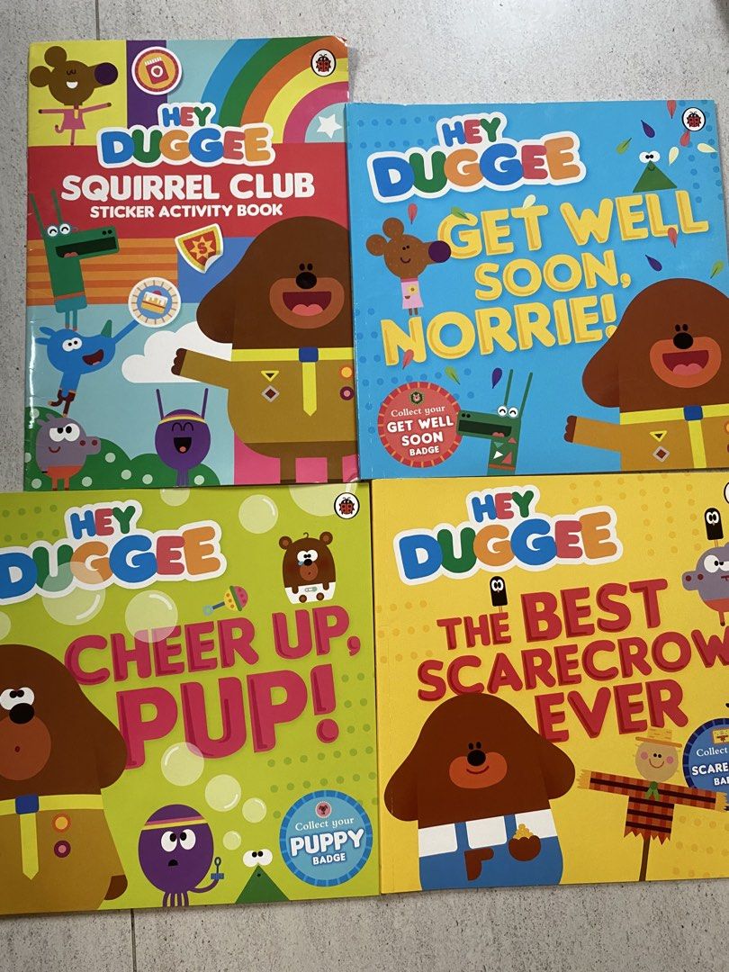 Hey Duggee Collection 4-Book Set with Bag (Category: Children's Books) located in Quezon City. Submitted by donagraceliwanag (Listing ID 1465071257, Image 3). Description: - Hey Duggee collection set in a reusable blue zip storage bag with handle - Includes 4 story and activity books (Squirrel Club Sticker Activity Book, Get Well Soon Norrie!, Cheer Up Pup!, The Best Scarecrow Ever) - Clean condition and ready for reading and sticker fun - Great 