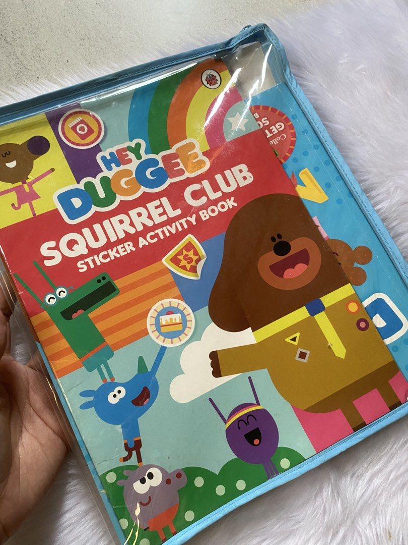 Hey Duggee Collection 4-Book Set with Bag (Category: Children's Books) located in Quezon City. Submitted by donagraceliwanag (Listing ID 1465071257, Image 2). Description: - Hey Duggee collection set in a reusable blue zip storage bag with handle - Includes 4 story and activity books (Squirrel Club Sticker Activity Book, Get Well Soon Norrie!, Cheer Up Pup!, The Best Scarecrow Ever) - Clean condition and ready for reading and sticker fun - Great 