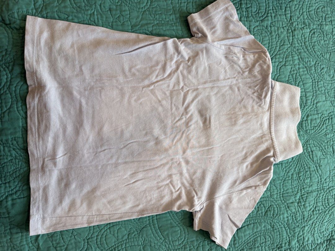 H&M Basic Organic Cotton Light Purple Polo Shirt (Category: Tshirts & Polo Shirts ) located in Quezon City. Submitted by krisallie (Listing ID 1465029947, Image 3). Description: - Brand/Model: H&M Basic Kids - Color: Light blue - Material: 100% Organic cotton - Size: EUR 122/128 (US 6-8Y) - Design: Short sleeves, ribbed collar, two-button placket - Condition: Excellent, simple and comfortable basic top.
