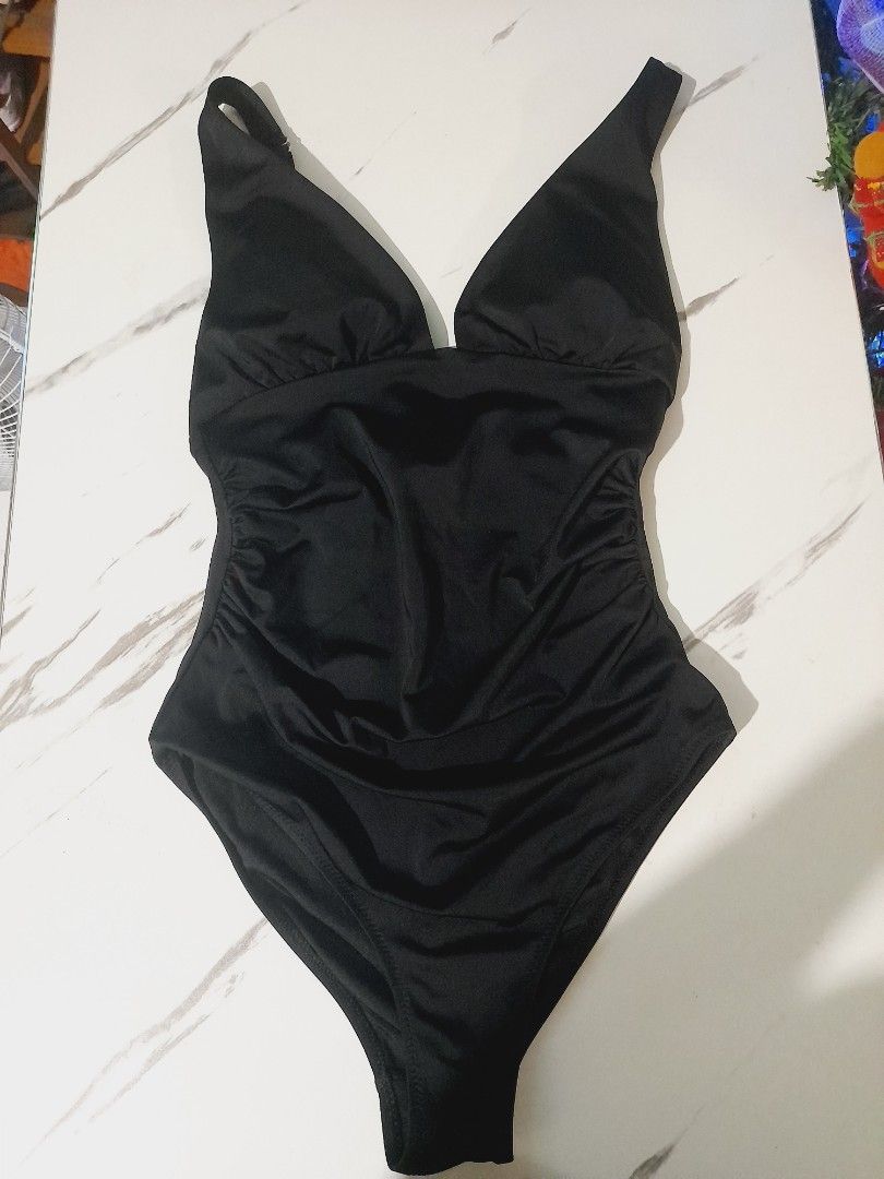 H&M black swimsuit (Category: Bikinis & Swimsuits) located in Manila. Submitted by rosegomez046149 (Listing ID 1465135022, Image 1). Description: i bought it but its too small for me so i didnt wear it can fit xs -mediun only new cut tag.