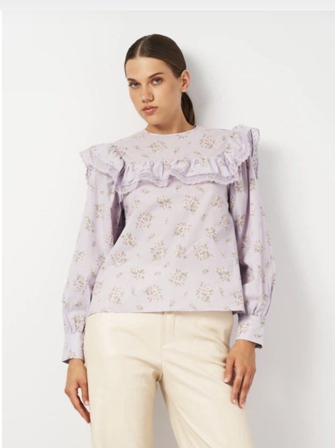 H&M cotton ruffled Top (Category: Blouses) located in Paranaque City. Submitted by famsale2016 (Listing ID 1465060341, Image 1). Description: Likenew to Bnew condition ✨ Size S on tag can fit M - This lavender H&M cotton blouse features a charming lace-trimmed ruffled yoke and a delicate all-over floral print..