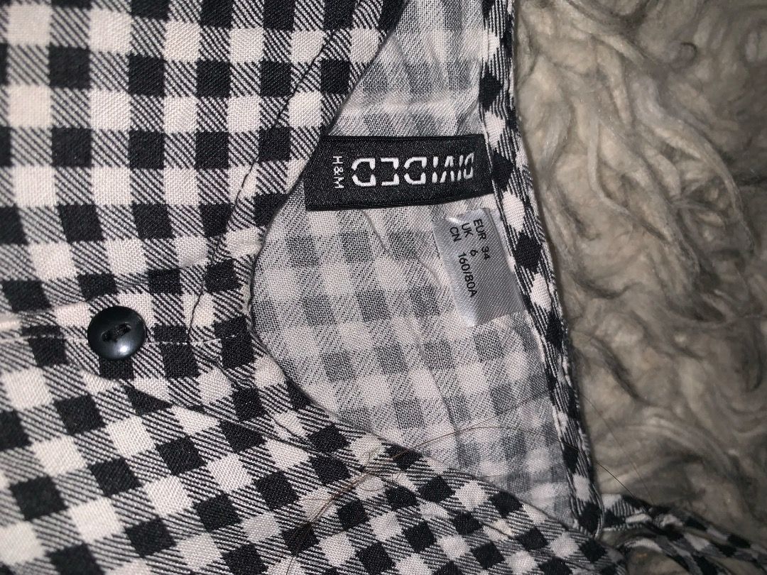 H&M Divided Black and White Gingham Dress (Category: Dresses) located in Manila. Submitted by anngeline_reyes (Listing ID 1465111079, Image 3). Description: H&M DIVIDED BLACK AND WHITE GINGHAM DRESS 🖤🤍 Price: ₱150 + shipping fee • Brand: H&M Divided • Size: small to medium, can fit to mid-large • Preloved — good condition • Colors may vary slightly due to lighting conditions and screen settings. “Sure buyer only” ⚠️ 📍 Quezon City Mode of deliv