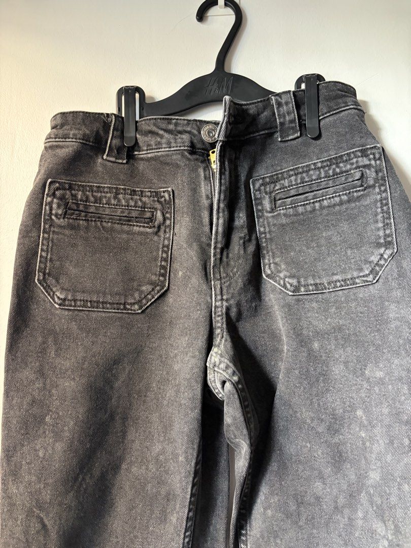 H&M High Waisted Flared Denim Pants (Category: Jeans) located in Las Pinas. Submitted by bibliomomma (Listing ID 1465033521, Image 2). Description: Authentic H&M acid-washed grey/black denim pants featuring a stylish high waisted, flared leg silhouette. Designed with front utility patch pockets with stitched trim, back patch pockets, belt loops, and a front zip fly with button closure. Photos posted are final (no photo when worn) and accurately s