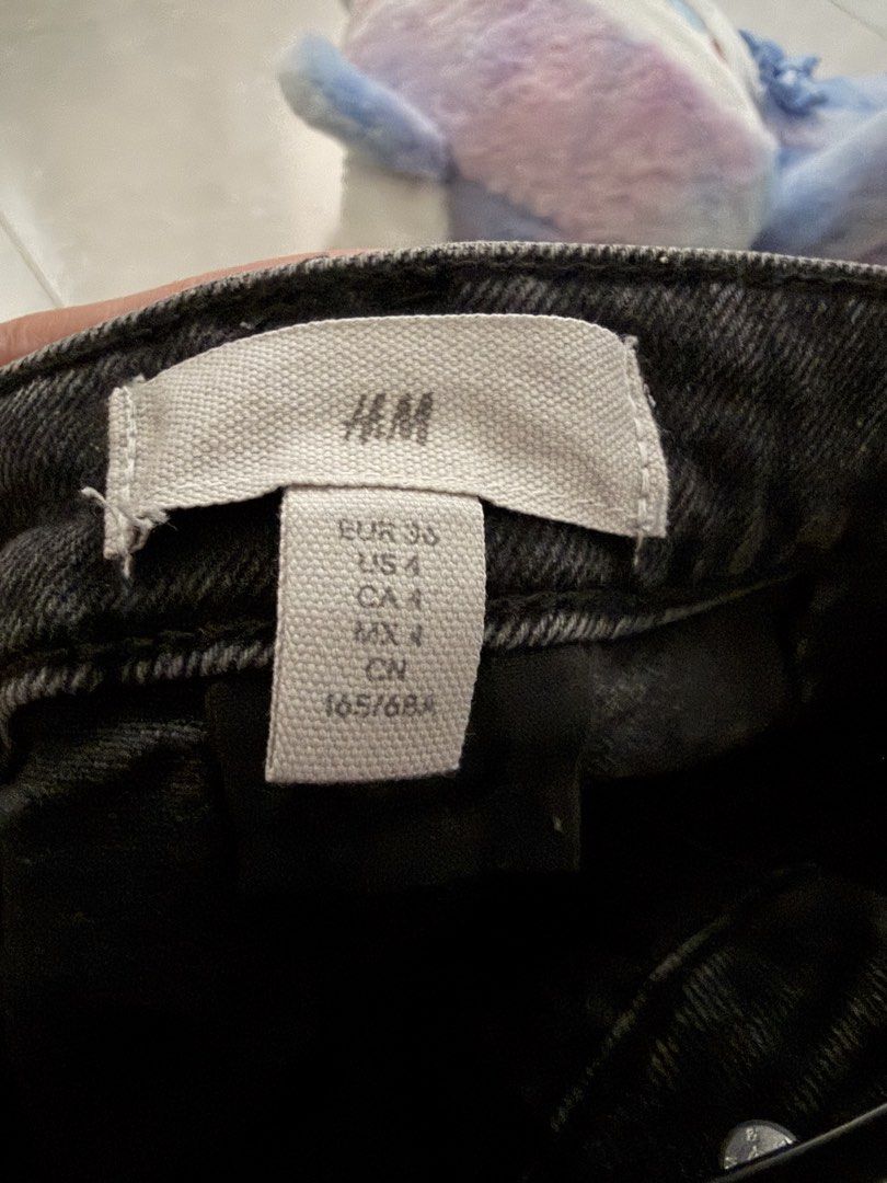 H&M High Waisted Flared Denim Pants (Category: Jeans) located in Las Pinas. Submitted by bibliomomma (Listing ID 1465033521, Image 3). Description: Authentic H&M acid-washed grey/black denim pants featuring a stylish high waisted, flared leg silhouette. Designed with front utility patch pockets with stitched trim, back patch pockets, belt loops, and a front zip fly with button closure. Photos posted are final (no photo when worn) and accurately s