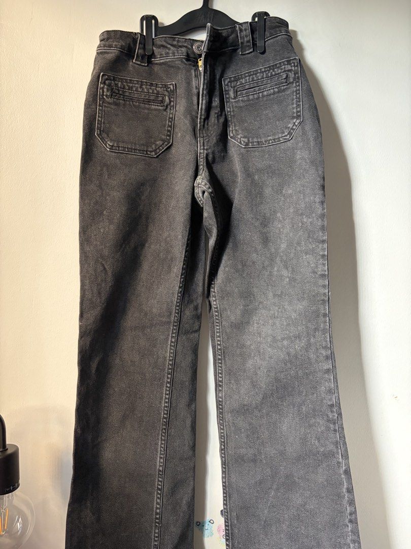H&M High Waisted Flared Denim Pants (Category: Jeans) located in Las Pinas. Submitted by bibliomomma (Listing ID 1465033521, Image 1). Description: Authentic H&M acid-washed grey/black denim pants featuring a stylish high waisted, flared leg silhouette. Designed with front utility patch pockets with stitched trim, back patch pockets, belt loops, and a front zip fly with button closure. Photos posted are final (no photo when worn) and accurately s