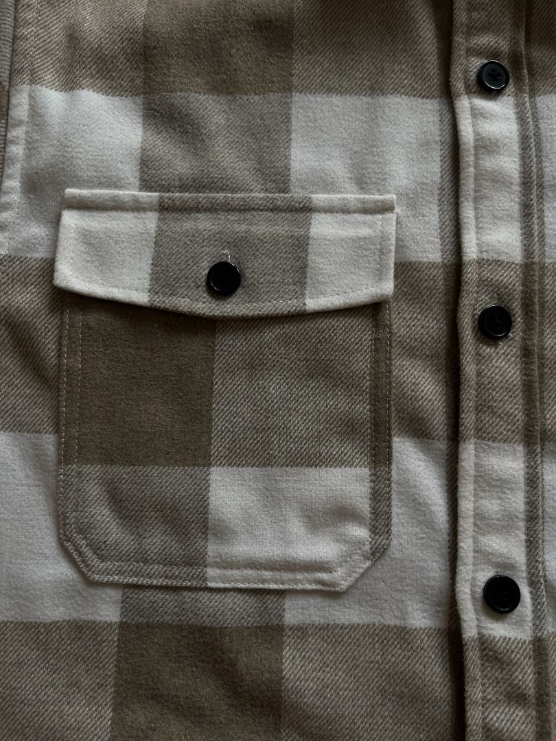 H&M Plaid Flannel Shirt (Category: Tshirts & Polo Shirts ) located in Lipa City. Submitted by thesecondrackph (Listing ID 1465020049, Image 3). Description: - Brand: H&M - Item: Plaid flannel shirt - Color: Brown and white checkered - Size: L - Length: 28" - Width: 24" - Fit: Regular - Features: Long sleeves with button cuffs, front button closure, two chest pockets with button flaps - Material: Soft fabric, great for layering.