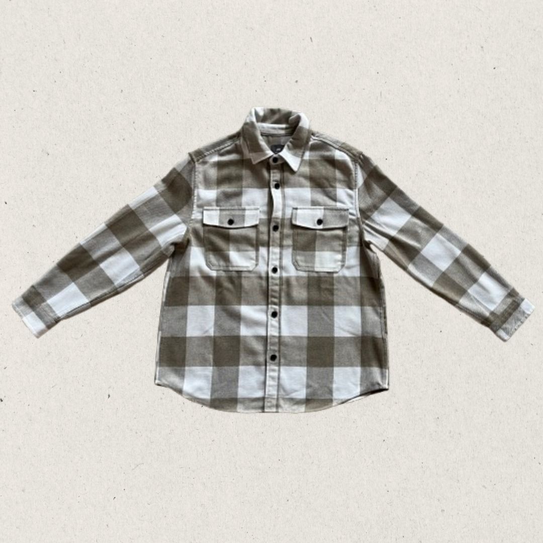 H&M Plaid Flannel Shirt (Category: Tshirts & Polo Shirts ) located in Lipa City. Submitted by thesecondrackph (Listing ID 1465020049, Image 1). Description: - Brand: H&M - Item: Plaid flannel shirt - Color: Brown and white checkered - Size: L - Length: 28" - Width: 24" - Fit: Regular - Features: Long sleeves with button cuffs, front button closure, two chest pockets with button flaps - Material: Soft fabric, great for layering.